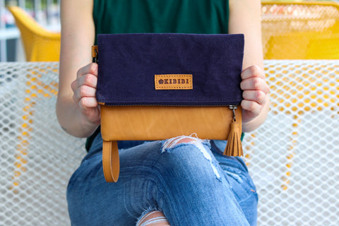 Kunja Tan Leather and Navy Canvas Wristlet